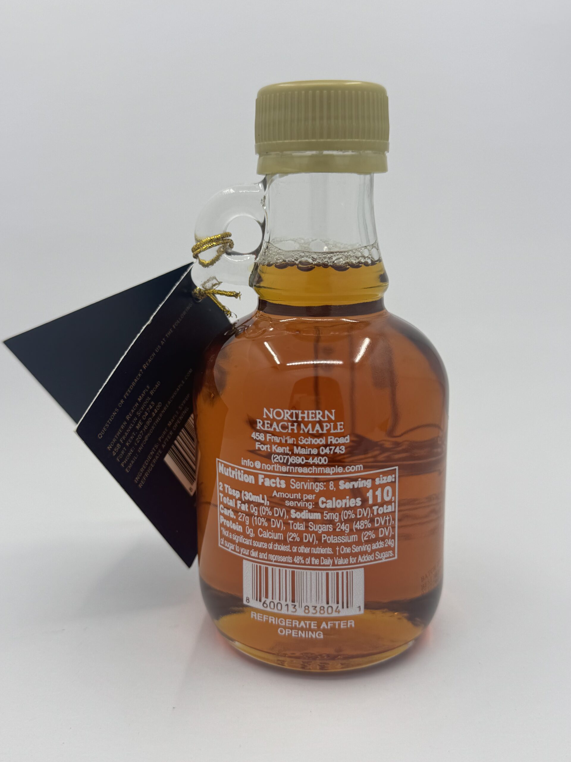 The back of a bottle of Season's Finest Pure Maine Maple Syrup.