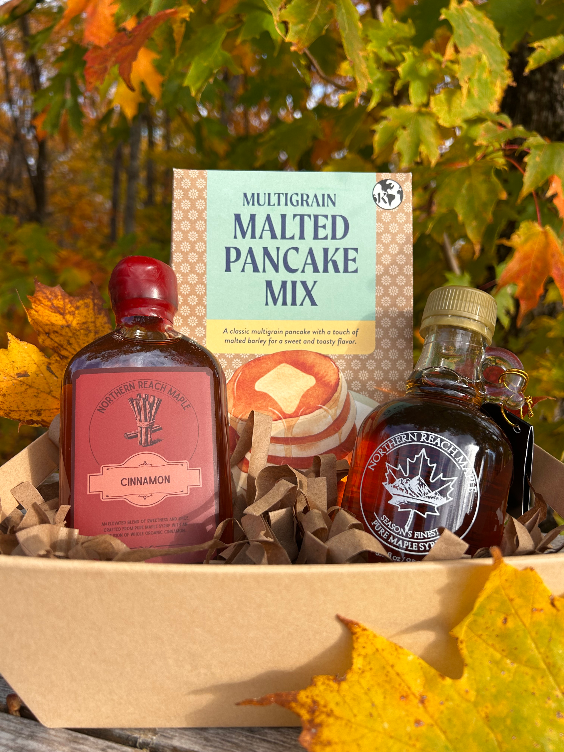 Breakfast Bundle Gift Basket with Season's Finest Pure Maine Maple Syrup, maple sugar, flavored maple syrup, and multigrain pancake mix.