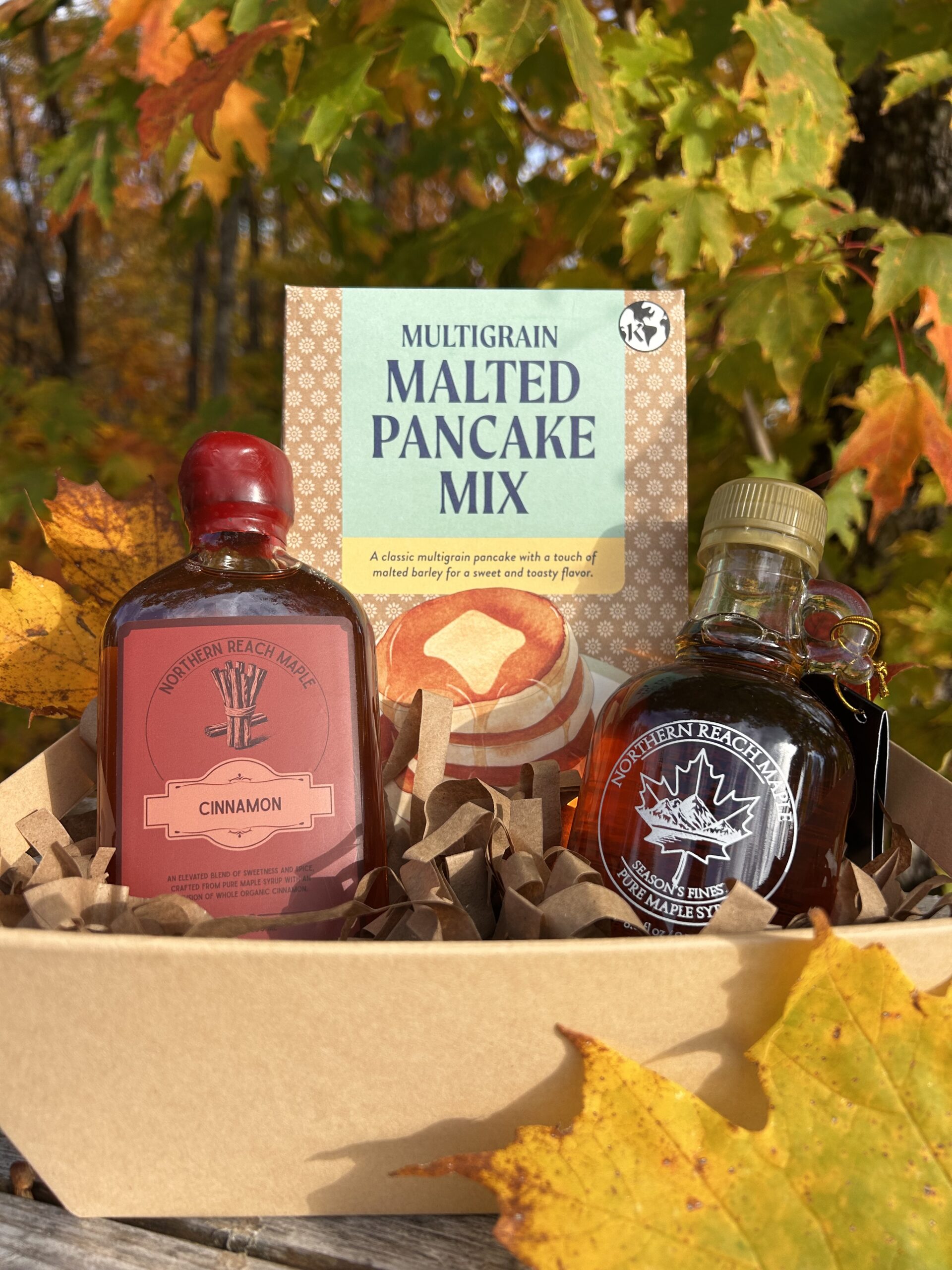 Breakfast Bundle Gift Basket with Season's Finest Pure Maine Maple Syrup, maple sugar, flavored maple syrup, and multigrain pancake mix.