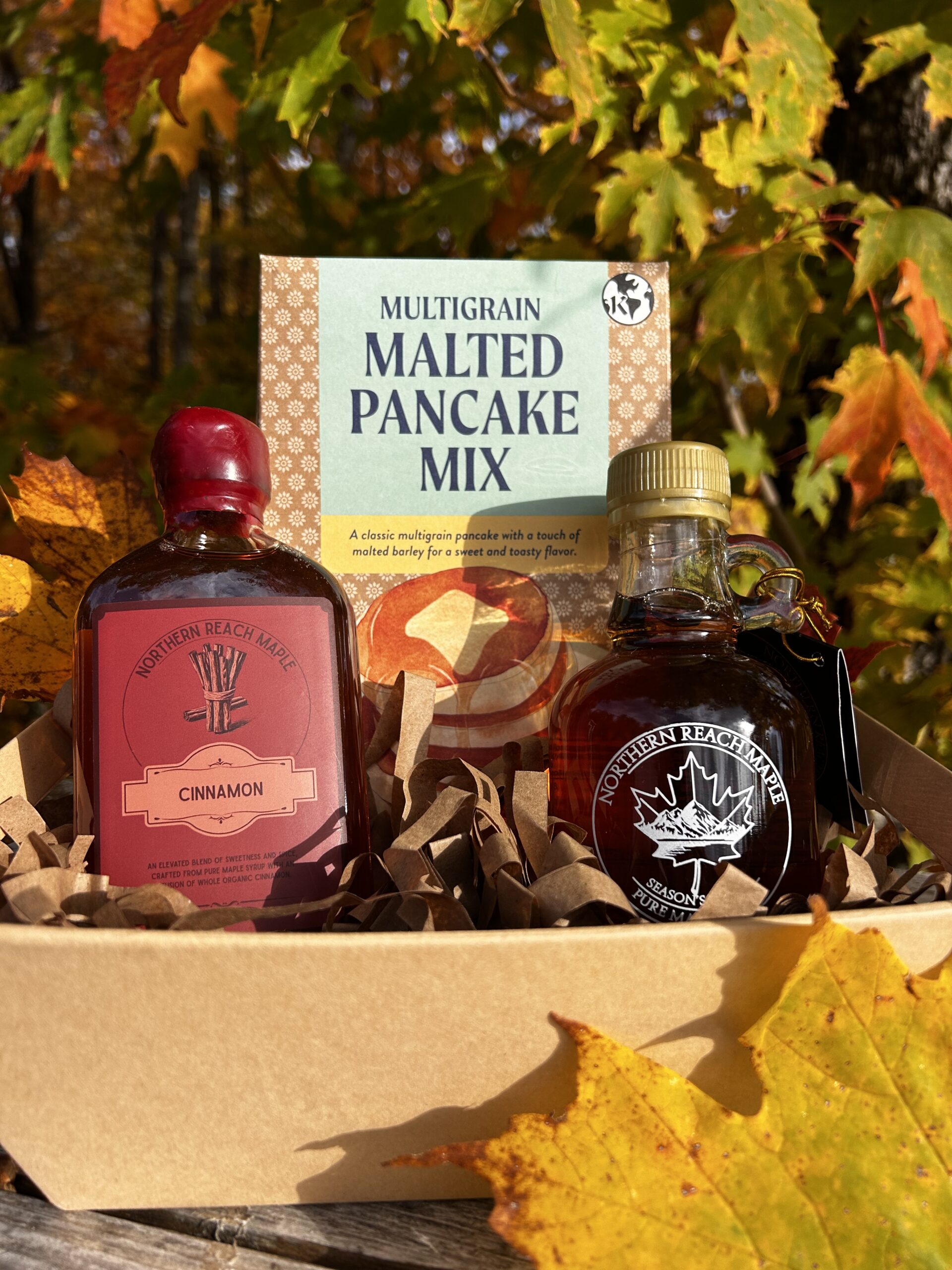 Breakfast Bundle Gift Basket with Season's Finest Pure Maine Maple Syrup, maple sugar, flavored maple syrup, and multigrain pancake mix.