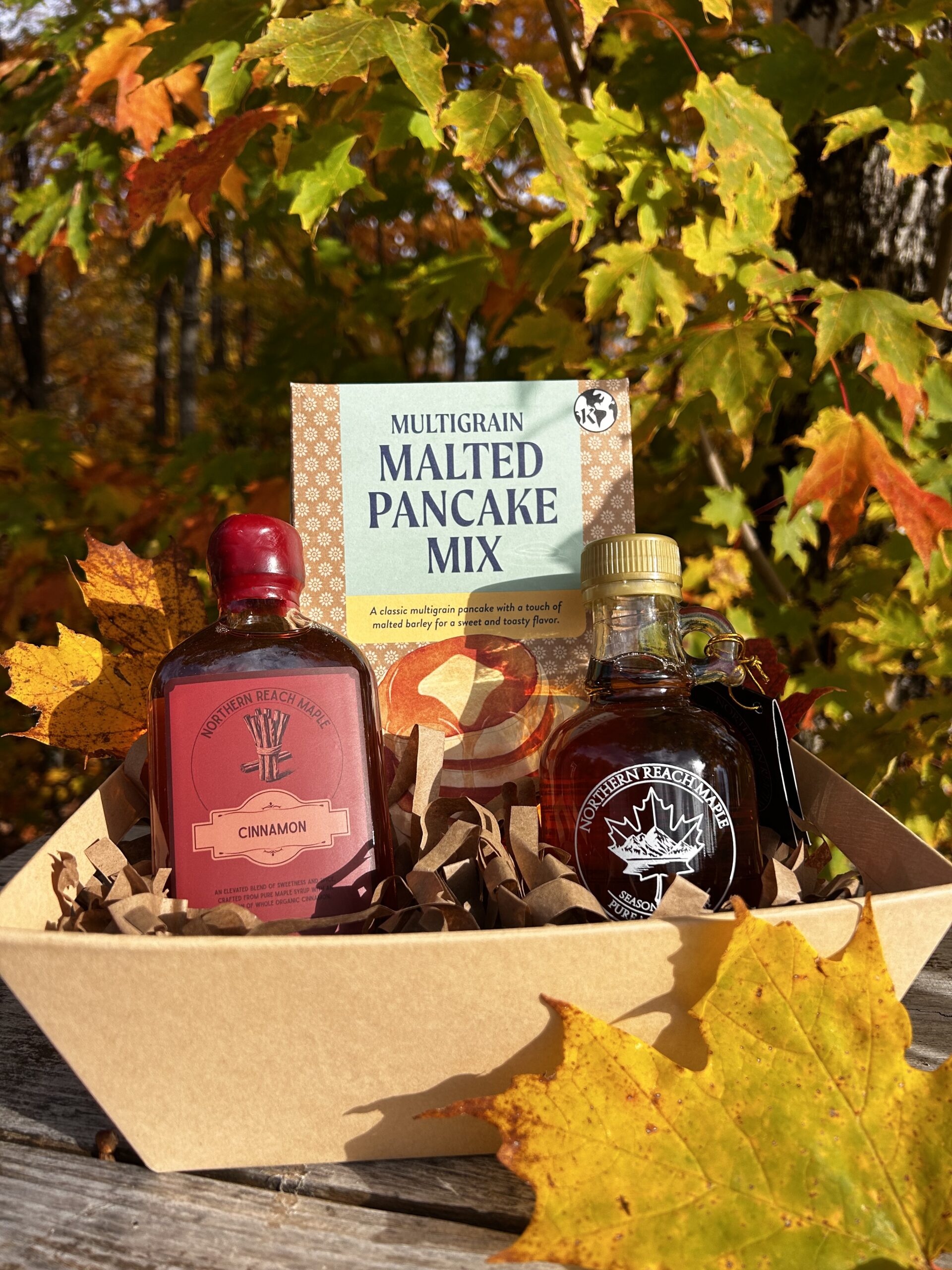 Breakfast Bundle Gift Basket with Season's Finest Pure Maine Maple Syrup, maple sugar, flavored maple syrup, and multigrain pancake mix.