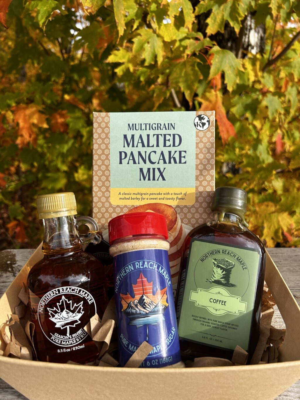 Breakfast Bundle Gift Basket with Season's Finest Pure Maine Maple Syrup, maple sugar, flavored maple syrup, and multigrain pancake mix.
