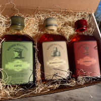 Barrel, Bean, and Bark Trio of flavor infused maple syrups consisting of coffee, cinnamon and bourbon barrel maple syrups.