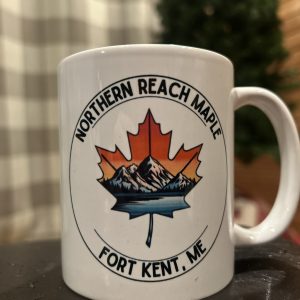 A picture of a coffee mug with Northern Reach Maple's logo printed on it.